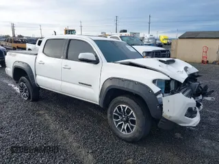 2021 Toyota Tacoma SR z VIN 3TMCZ5AN2MM426723, wystawiony jako IAAI lot #41604033 z przebiegiem 46 522 mil mil oraz . Historia ofert i sprzedaży dostępna na DreamBid. Obrazek 1.
