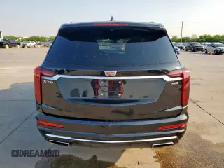 2021 Cadillac XT6 Premium Luxury z VIN 1GYKPCRS3MZ195999, wystawiony jako Copart lot #53261595 z przebiegiem 81 843 mil mil oraz Szkoda całkowita • Salvage title. Historia ofert i sprzedaży dostępna na DreamBid. Obrazek 6.