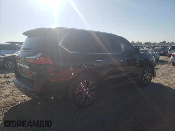2020 Lexus LX 570 with VIN JTJDY7AX9L4332897, listed as a Copart auction lot 71180324 with 42,878 mi miles and Salvage title. Bid and sale history available at DreamBid. Image 3.
