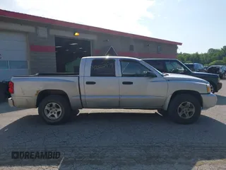 2006 Dodge Dakota SLT with VIN 1D7HW48N56S503261, listed as a IAAI auction lot 42562979 with 200,676 mi miles and . Bid and sale history available at DreamBid. Image 13.