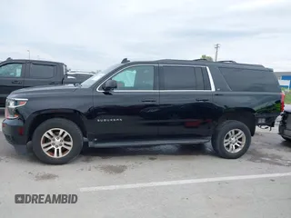 2016 Chevrolet Suburban LT z VIN 1GNSKHKC7GR315884, wystawiony jako IAAI lot #41977108 z przebiegiem 138 902 mil mil oraz . Historia ofert i sprzedaży dostępna na DreamBid. Obrazek 14.
