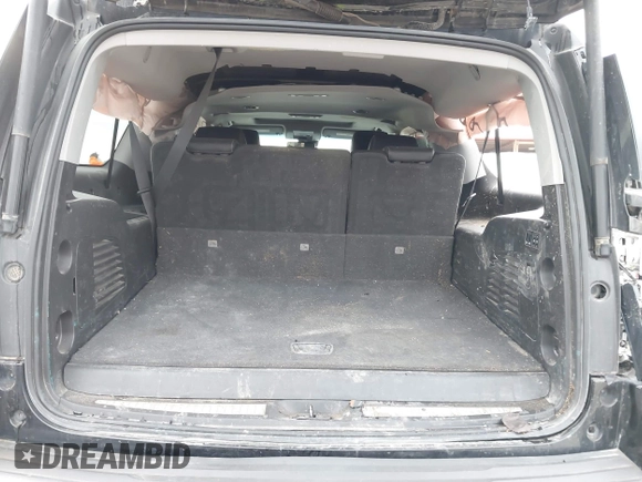 2019 Chevrolet Suburban Premier with VIN 1GNSKJKC7KR261826, listed as a IAAI auction lot 41652451 with 127,032 mi miles and . Bid and sale history available at DreamBid. Image 17.