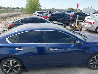 2017 Nissan Altima SV with VIN 1N4AL3AP0HC278809, listed as a IAAI auction lot 42087711 with 113,676 mi miles and . Bid and sale history available at DreamBid. Image 13.