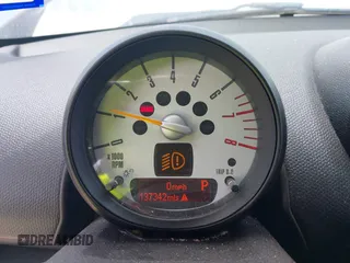 2014 MINI Countryman S with VIN WMWZC3C52EWP28069, listed as a IAAI auction lot 42026583 with 137,342 mi miles and . Bid and sale history available at DreamBid. Image 7.