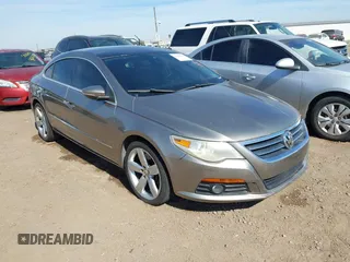 2009 Volkswagen CC 4Motion with VIN WVWGU73C89E519864, listed as a IAAI auction lot 41384195 with 154,792 mi miles. Bid and sale history available at carsss.com. Image 1.
