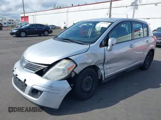 2011 Nissan Versa 1.8 S with VIN 3N1BC1CP1BL505519, listed as a IAAI auction lot 41874588 with 142,434 mi miles. Bid and sale history available at carsss.com. Image 2.