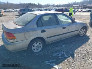 1997 Honda Civic LX with VIN 2HGEJ667XVH508376, listed as a IAAI auction lot 41649408 with 173270 miles. Bid and sale history available at carsss.com. Image 4.