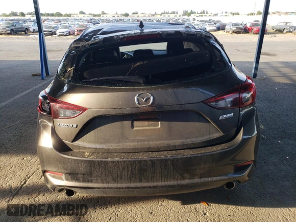2018 Mazda 3 Touring z VIN 3MZBN1L30JM195471, wystawiony jako Copart lot #57497115 z przebiegiem 147 899 mil mil oraz Szkoda całkowita • Salvage title. Historia ofert i sprzedaży dostępna na DreamBid. Obrazek 6.