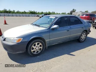 2000 Toyota Camry CE with VIN JT2BG22K9Y0521639, listed as a Copart auction lot 55075485 with 248,460 mi miles and Salvage Title. Bid and sale history available at carsss.com. Image 1.