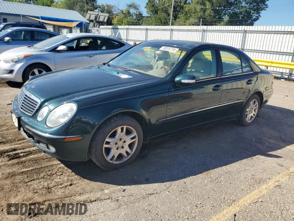 2003 Mercedes-Benz E-Class 3.2L with VIN WDBUF65J53A101021, listed as a Copart auction lot 73015774 with 242,812 mi miles and Clean Title. Bid and sale history available at carsss.com. Image 1.