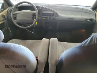1992 Ford Taurus z VIN 1FACP50U4NA144506, wystawiony jako Copart lot #80000064 z przebiegiem 40 600 mil mil oraz Czysty tytuł • Clean title. Historia ofert i sprzedaży dostępna na DreamBid. Obrazek 8.