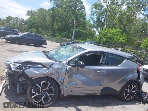 2018 Toyota C-HR XLE with VIN JTNKHMBX7J1009692, listed as a IAAI auction lot 42390685 with 77,866 mi miles and . Bid and sale history available at DreamBid. Image 15.