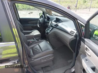 2012 Honda Odyssey EX-L with VIN 5FNRL5H68CB060487, listed as a IAAI auction lot 42176223 with 234,078 mi miles and . Bid and sale history available at DreamBid. Image 5.