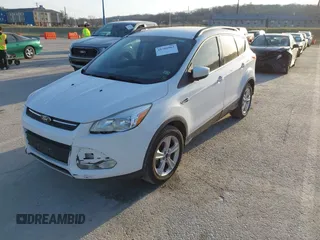 2016 Ford Escape SE with VIN 1FMCU9GX0GUC03719, listed as a IAAI auction lot 41781963 with 85,382 mi miles. Bid and sale history available at carsss.com. Image 2.