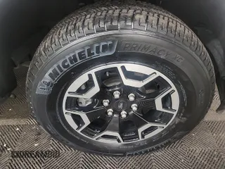 2023 Ford F-150 Lightning Pro z VIN 1FTVW1EL0PWG02840, wystawiony jako IAAI lot #42379448 z przebiegiem 52 710 mil mil oraz . Historia ofert i sprzedaży dostępna na DreamBid. Obrazek 40.