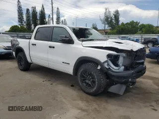 2025 Ram 1500 Rebel z VIN 1C6SRFLP7SN584078, wystawiony jako Copart lot #64027035 z przebiegiem 7 584 mil mil oraz Czysty tytuł • Clean title. Historia ofert i sprzedaży dostępna na DreamBid. Obrazek 4.