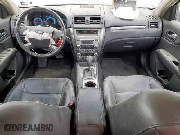 2012 Ford Fusion SEL z VIN 3FAHP0JG1CR141390, wystawiony jako Copart lot #59308505 z przebiegiem 63 955 mil mil oraz Szkoda całkowita • Salvage title. Historia ofert i sprzedaży dostępna na DreamBid. Obrazek 8.