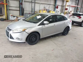 2012 Ford Focus SE with VIN 1FAHP3F26CL207199, listed as a IAAI auction lot 42149458 with 242,158 mi miles. Bid and sale history available at carsss.com. Image 2.