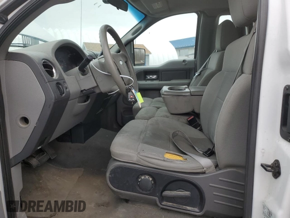 2004 Ford F-150 XL with VIN 1FTRF14W24NA80971, listed as a Copart auction lot 48242325 with 150,293 mi miles and Salvage Title. Bid and sale history available at DreamBid. Image 7.