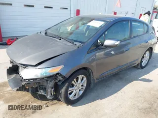 2011 Honda Insight EX z VIN JHMZE2H7XBS006254, wystawiony jako IAAI lot #42222213 z przebiegiem 244 078 mil mil oraz . Historia ofert i sprzedaży dostępna na DreamBid. Obrazek 2.