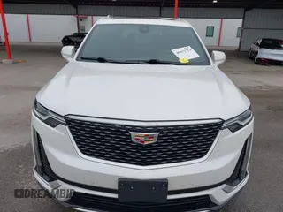 2021 Cadillac XT6 Premium Luxury z VIN 1GYKPCRS8MZ233209, wystawiony jako IAAI lot #40012714 z przebiegiem 45 599 mil mil oraz . Historia ofert i sprzedaży dostępna na DreamBid. Obrazek 6.