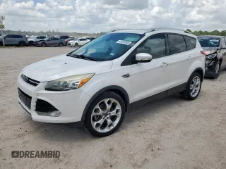2015 Ford Escape Titanium with VIN 1FMCU0J96FUA51806, listed as a Copart auction lot 61097865 with 105,600 mi miles and Salvage title. Bid and sale history available at DreamBid. Image 1.