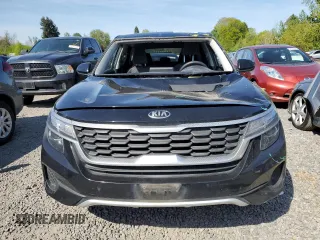2021 Kia Seltos LX z VIN KNDEPCAA0M7097143, wystawiony jako Copart lot #54057815 z przebiegiem 59 930 mil mil oraz Szkoda całkowita • Salvage title. Historia ofert i sprzedaży dostępna na DreamBid. Obrazek 5.