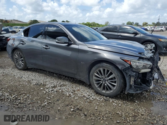 2020 Infiniti Q50 Edition 30 with VIN JN1EV7AP4LM205056, listed as a Copart auction lot 51043005 with 54,493 mi miles and Salvage Title. Bid and sale history available at DreamBid. Image 4.