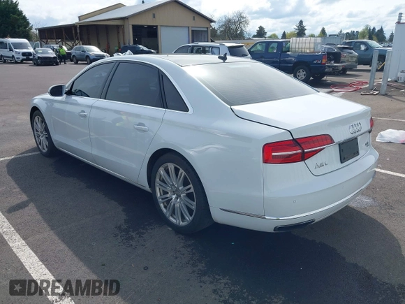 2015 Audi A8 4.0T with VIN WAU32AFD6FN039739, listed as a IAAI auction lot 41946401 with 102,668 mi miles and . Bid and sale history available at DreamBid. Image 3.