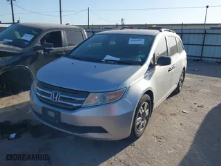 2012 Honda Odyssey LX with VIN 5FNRL5H28CB019838, listed as a IAAI auction lot 41844803 with 179,454 mi miles. Bid and sale history available at carsss.com. Image 2.