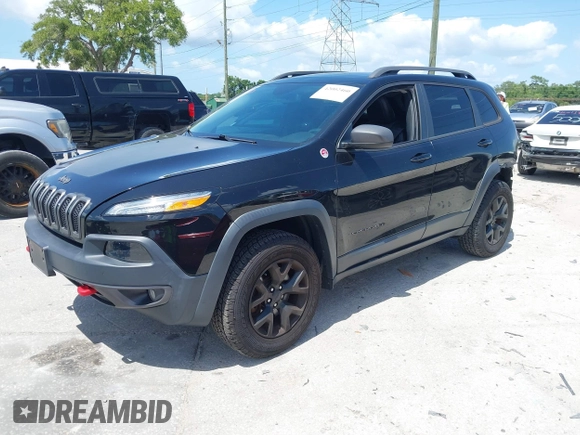 2017 Jeep Cherokee Trailhawk with VIN 1C4PJMBS9HW537962, listed as a IAAI auction lot 42002460 with 129,037 mi miles and . Bid and sale history available at DreamBid. Image 18.