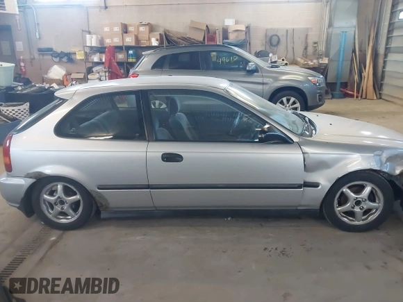 1998 Honda Civic DX with VIN 2HGEJ6342WH101132, listed as a IAAI auction lot 41253094 with 179,169 mi miles. Bid and sale history available at carsss.com. Image 14.
