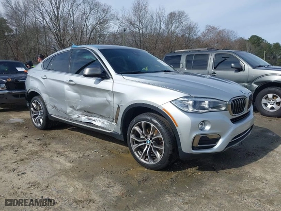 2019 BMW X6 xDrive35i with VIN 5UXKU2C52K0Z63984, listed as a IAAI auction lot 41612265 with 65,634 mi miles. Bid and sale history available at carsss.com. Image 1.