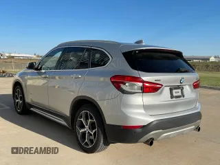 2017 BMW X1 sDrive28i with VIN WBXHU7C39H5H34971, listed as a Copart auction lot 51869265 with 108,051 mi miles and Clean Title. Bid and sale history available at carsss.com. Image 3.