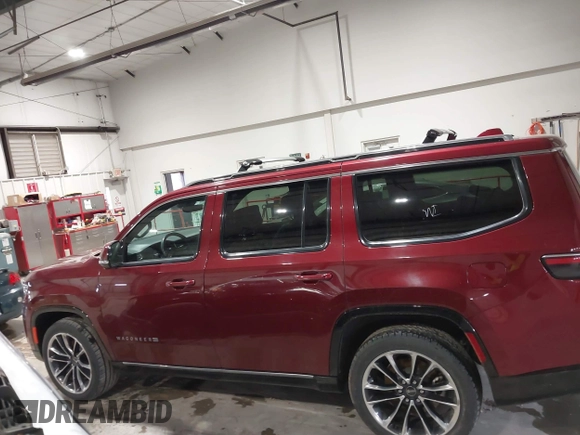 2022 Jeep Wagoneer Series III with VIN 1C4SJVDT4NS113100, listed as a IAAI auction lot 41727706 with 64,694 mi miles and . Bid and sale history available at DreamBid. Image 14.