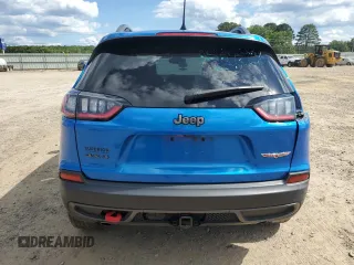2019 Jeep Cherokee Trailhawk with VIN 1C4PJMBX0KD311114, listed as a Copart auction lot 58799765 with 60,833 mi miles and Salvage title. Bid and sale history available at DreamBid. Image 6.
