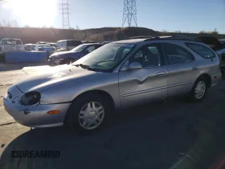 1999 Ford Taurus SE with VIN 1FAFP58U5XG240517, listed as a Copart auction lot 83514044 with 101,092 mi miles and Clean title. Bid and sale history available at DreamBid. Image 1.
