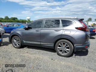 2021 Honda CR-V Touring z VIN 2HKRW2H95MH675002, wystawiony jako Copart lot #57340315 z przebiegiem 41 159 mil mil oraz Szkoda całkowita • Salvage title. Historia ofert i sprzedaży dostępna na DreamBid. Obrazek 2.