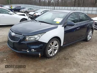 2014 Chevrolet Cruze LTZ z VIN 1G1PG5SB7E7335060, wystawiony jako IAAI lot #41710133 z przebiegiem 170 000 mil mil oraz . Historia ofert i sprzedaży dostępna na DreamBid. Obrazek 2.