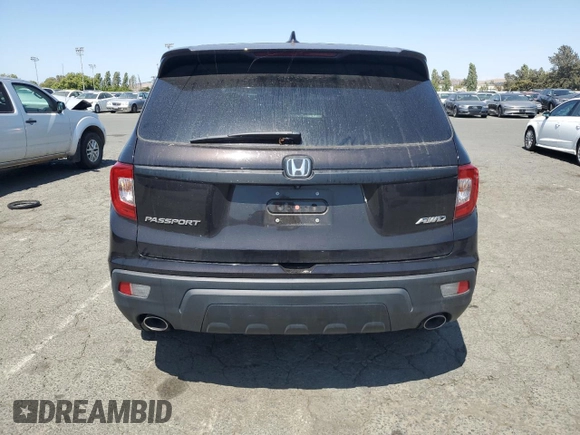 2020 Honda Passport EX-L z VIN 5FNYF8H54LB000315, wystawiony jako Copart lot #59194895 z przebiegiem 52 048 mil mil oraz Szkoda całkowita • Salvage title. Historia ofert i sprzedaży dostępna na DreamBid. Obrazek 6.