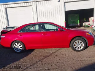 2007 Toyota Camry CE with VIN 4T1BE46K67U010279, listed as a IAAI auction lot 41504065 with 297,916 mi miles. Bid and sale history available at carsss.com. Image 13.