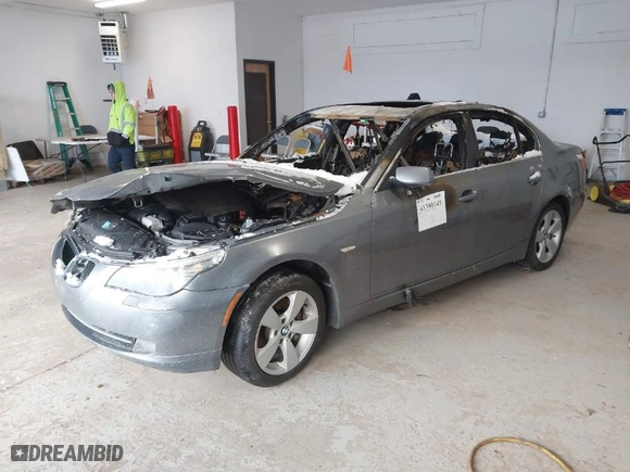 2008 BMW 5 Series 528xi with VIN WBANV13558CZ50771, listed as a IAAI auction lot 41380149 with 1 mi miles. Bid and sale history available at carsss.com. Image 2.