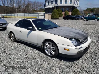 1998 Honda Prelude with VIN JHMBB6145WC009435, listed as a Copart auction lot 54256295 with 208,067 mi miles and Clean Title. Bid and sale history available at DreamBid. Image 4.