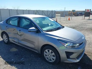 2023 Kia Rio S with VIN 3KPA24AD5PE524320, listed as a IAAI auction lot 41881897 with 48,615 mi miles. Bid and sale history available at carsss.com. Image 1.