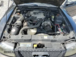 2001 Ford Mustang Deluxe z VIN 1FAFP44431F180282, wystawiony jako Copart lot #63592905 z przebiegiem 191 016 mil mil oraz Szkoda całkowita • Salvage title. Historia ofert i sprzedaży dostępna na DreamBid. Obrazek 11.