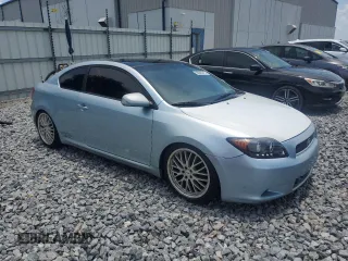 2006 Scion tC z VIN JTKDE167560101159, wystawiony jako Copart lot #58065315 z przebiegiem 136 428 mil mil oraz Szkoda całkowita • Salvage title. Historia ofert i sprzedaży dostępna na DreamBid. Obrazek 4.