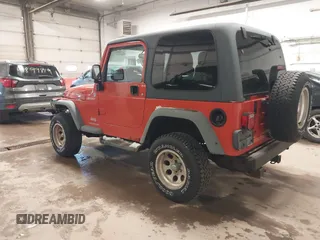 2006 Jeep Wrangler Sport with VIN 1J4FA49S06P729497, listed as a IAAI auction lot 41906227 with 134,573 mi miles. Bid and sale history available at carsss.com. Image 3.