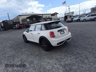 2021 MINI Hardtop 4 Door Cooper S with VIN WMWXU9C09M2P43346, listed as a Copart auction lot 68969854 with 22,394 mi miles and Salvage title. Bid and sale history available at DreamBid. Image 2.