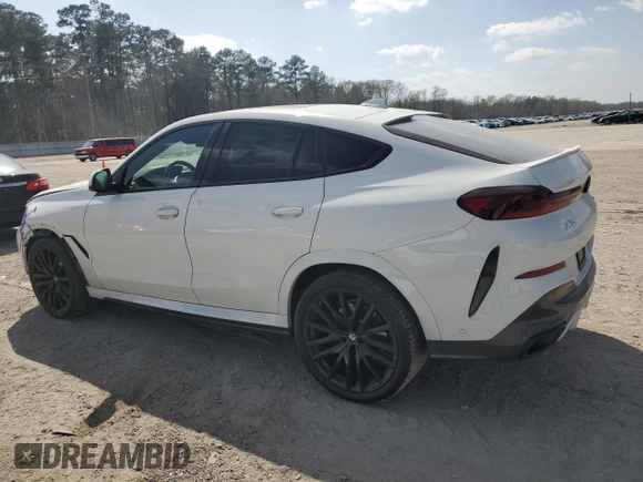 2022 BMW X6 xDrive40i z VIN 5UXCY6C0XN9K78927, wystawiony jako Copart lot #48348335 z przebiegiem 63 074 mil mil oraz Szkoda całkowita • Salvage title. Historia ofert i sprzedaży dostępna na DreamBid. Obrazek 2.