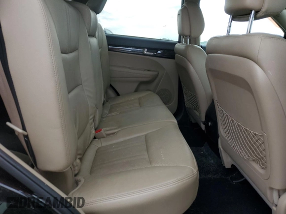 2012 Kia Sorento EX z VIN 5XYKU4A26CG252144, wystawiony jako Copart lot #56290995 z przebiegiem 220 802 mil mil oraz Szkoda całkowita • Salvage title. Historia ofert i sprzedaży dostępna na DreamBid. Obrazek 11.